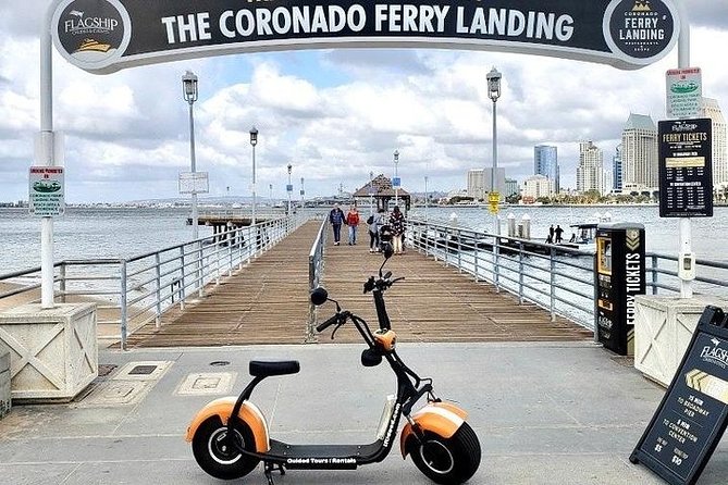 1 Hour GPS Guided Scooter Tour: Harbor/Gaslamp Quarter - The USS Midway, Maritime Museum, and the Unconditional Surrender Statue